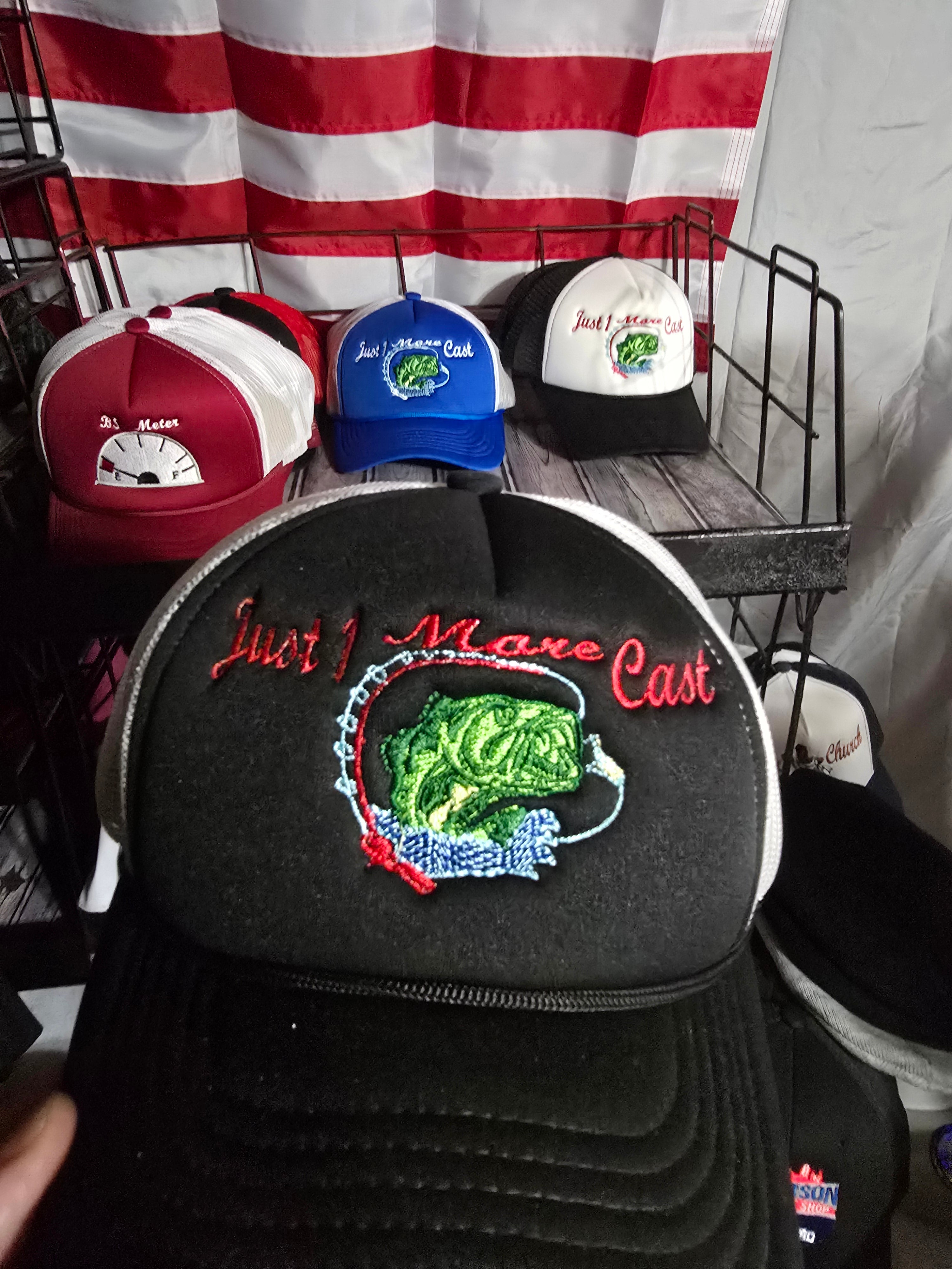 hat just 1 more cast logo with fish